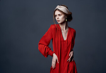 Elegant woman in red dress decoration luxury charm gray background