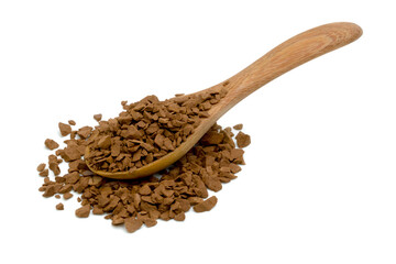 Instant coffee powder with wooden spoon isolated on white background