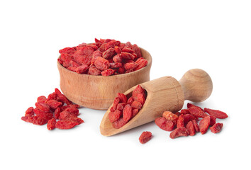 Bowl and scoop with dried goji berries on white background
