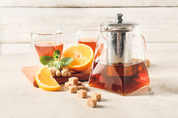 Composition with teapot on grunge background