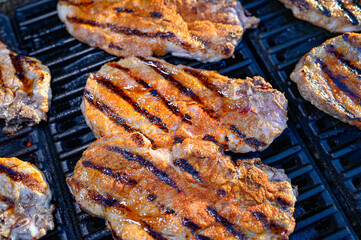 evening bbq of tenderloin meat on grill