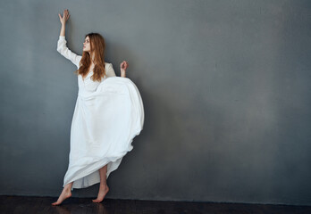 attractive woman white dress luxury performance studio 