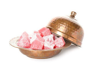 Plate with Turkish delight on white background