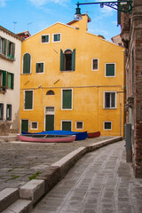 small inner courtyard with many gondolas, Venice, Italy