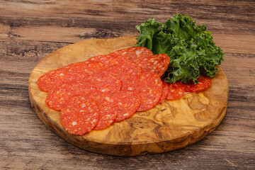 Italian spycy pepperoni sausage slices