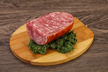 Beef ham piece over board