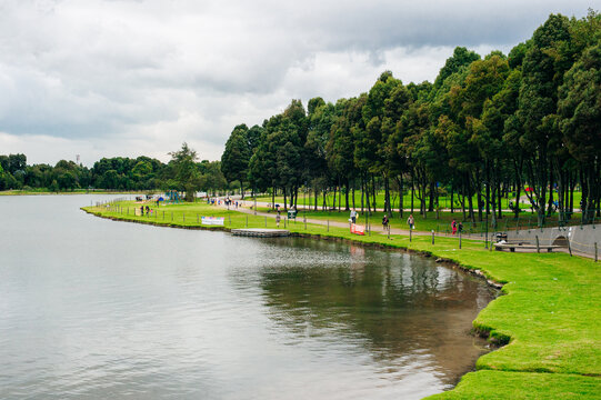 View of lake, trees and mountains in Simon Bolivar Metropolitan public park in the middle of Bogota