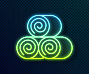 Glowing neon line Roll of hay icon isolated on black background. Vector