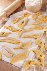 cooking traditional french bugne- carnival cake, angels wings