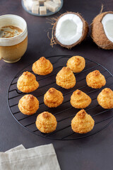 Coconut cookies on a dark background. Baking. Vegetarian food.