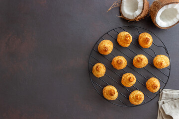 Obraz na płótnie Canvas Coconut cookies on a dark background. Baking. Vegetarian food.