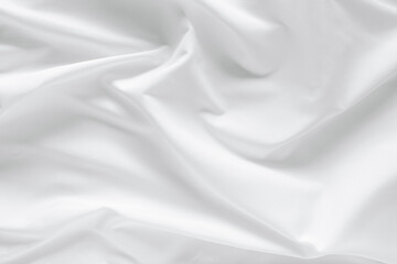 Abstract white fabric texture background. Cloth soft wave. Creases of satin, silk, and cotton.