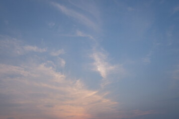 Fototapeta na wymiar The sky and the clouds and the setting sun