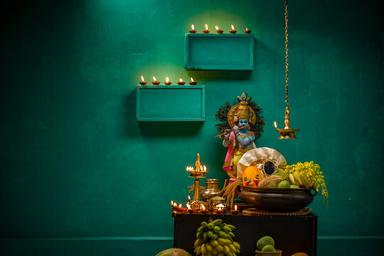 Kerala festival,rituals of Vishu festival -Vishukkani or Vishu sight, a brass vessel  filled with fruits,vegetable, mirror,golden shower flower and new cloth arranged  traditionally