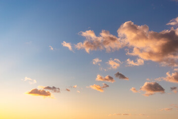 Colorful cloudy sky at sunset. Sky texture, nature background.