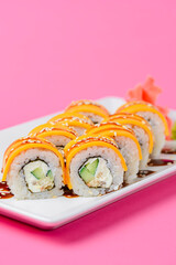 Sushi rolls philadelphia or california with cheddar and creame cheese, with tuna and avocado.