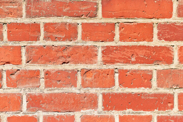 Background with old red stone brick wall
