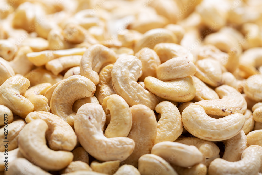 Poster cashew nuts as background