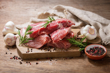 fresh pork meat with rosemary and spices