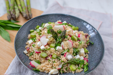 healthy spring couscous salad with asparagus and herbs
