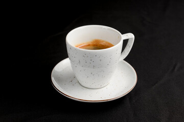 Coffee espresso over black background. Coffee time, isolated on black.