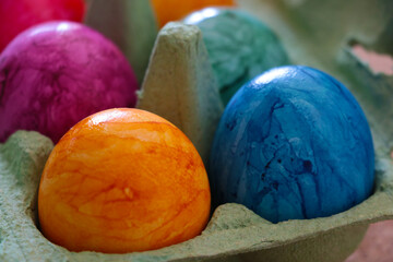 Beautiful multi-colored boiled eggs in a package.