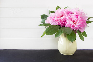 Pink peony flowers bouquet on white background with copy space. Mother's day, 8 march, women's day...