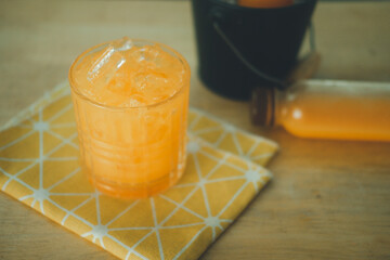 Fresh orange juice with ice cube