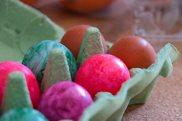 Beautiful multi-colored boiled eggs in a package.