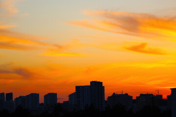 Fototapeta na wymiar View of the beautiful sunset over the city.