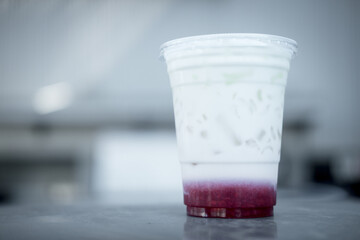 Fresh milk with delicious strawberry in plastic cup