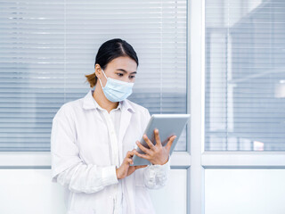 Portrait of Asian female doctor.