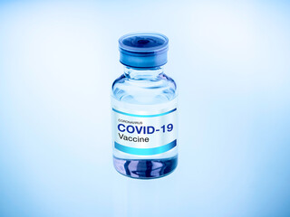 Covid-19 Coronavirus vaccine bottle with label.