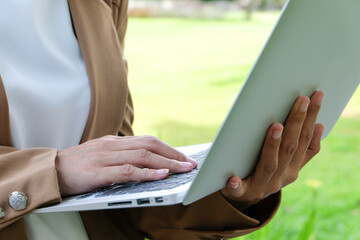 Freelance work concept. Confident busy freelancer in trendy eyewear doing remote job  in workplace
