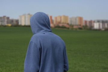 person in a hood
