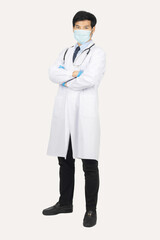 Isolated young Asian doctor wearing gloves and mask with stethoscope on white background. Healthcare and medical concept.