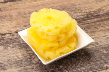 Sweet pineapple rings in the bowl