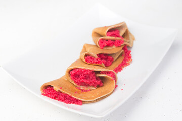 Blinis (crepes with red caviar typical of the Russian carnival)