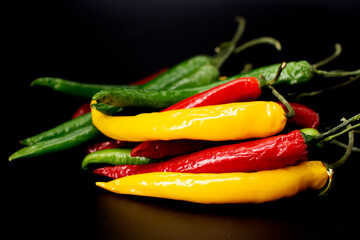 colorful chili pepper on a black background