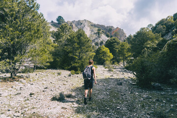 woman hiking on a mountain path in catalonia