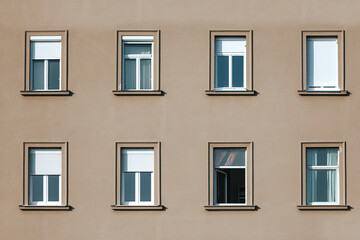 Fototapeta na wymiar View of front building wall with windows 