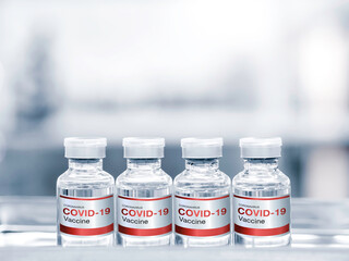 Covid-19 Coronavirus vaccine bottle with label.