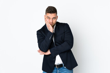 Young Russian business man isolated on white background unhappy and frustrated