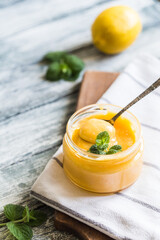 homemade lemon curd in a jar. delicious lemon cream or jam for a healthy snack