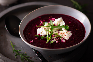 Fresh homemade vegetarian beetroot creamy soup with feta cheese