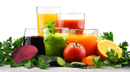 Glasses with fresh organic vegetable and fruit juices