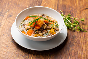 Beef stew with potatoes, carrots and herbs