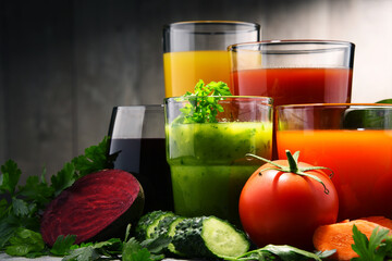 Glasses with fresh organic vegetable and fruit juices