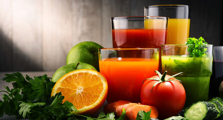 Glasses with fresh organic vegetable and fruit juices