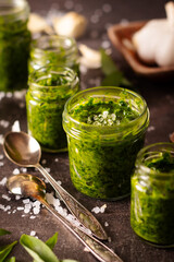 Fresh homemade wild garlic pesto in glass jar